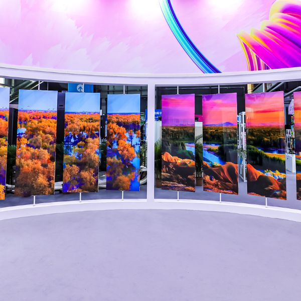 Curved display of landscape images printed using HP Indigo Print 15K Digital Press.